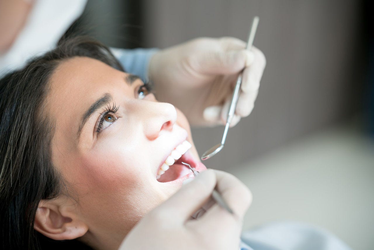 patient being treated by dentist
