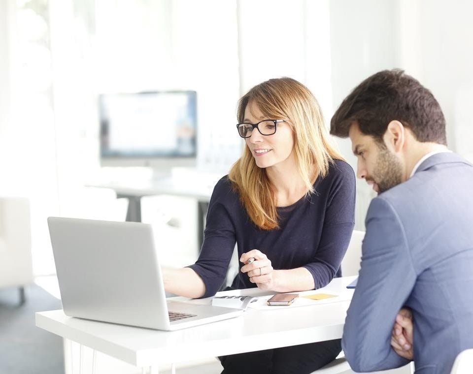 People reviewing audit findings