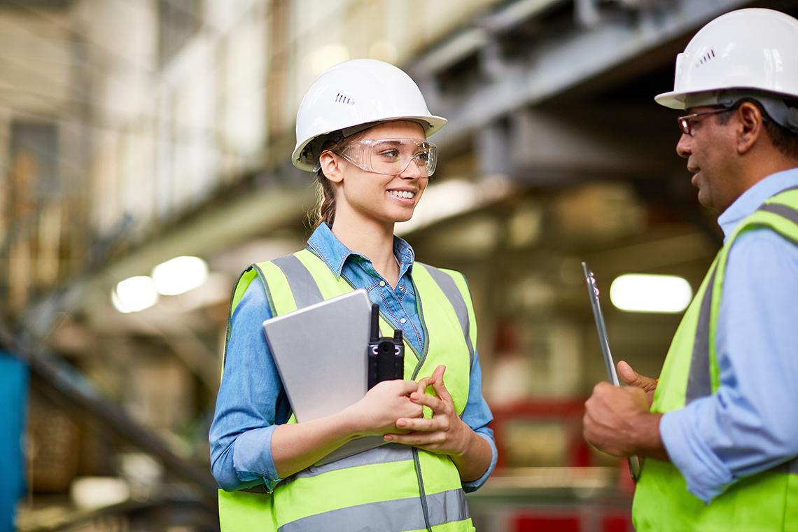 Female Apprentice talking to colleague